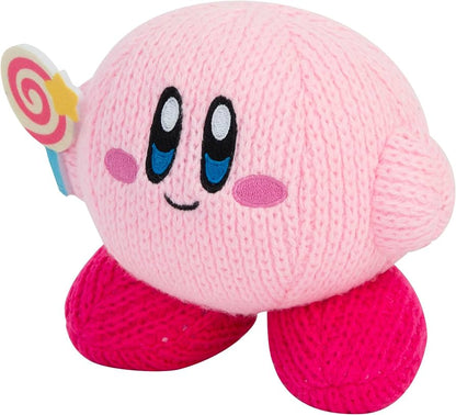Pink plush toy with a smiling face and colorful lollipop on a white background