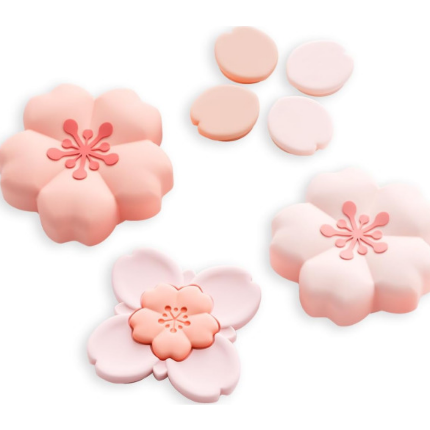 Pink flower-shaped controller grips on a white background